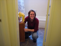 Rachel cleaning old apartment